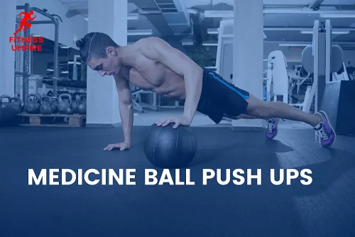 A man is practicing Medicine ball push ups in the gym.